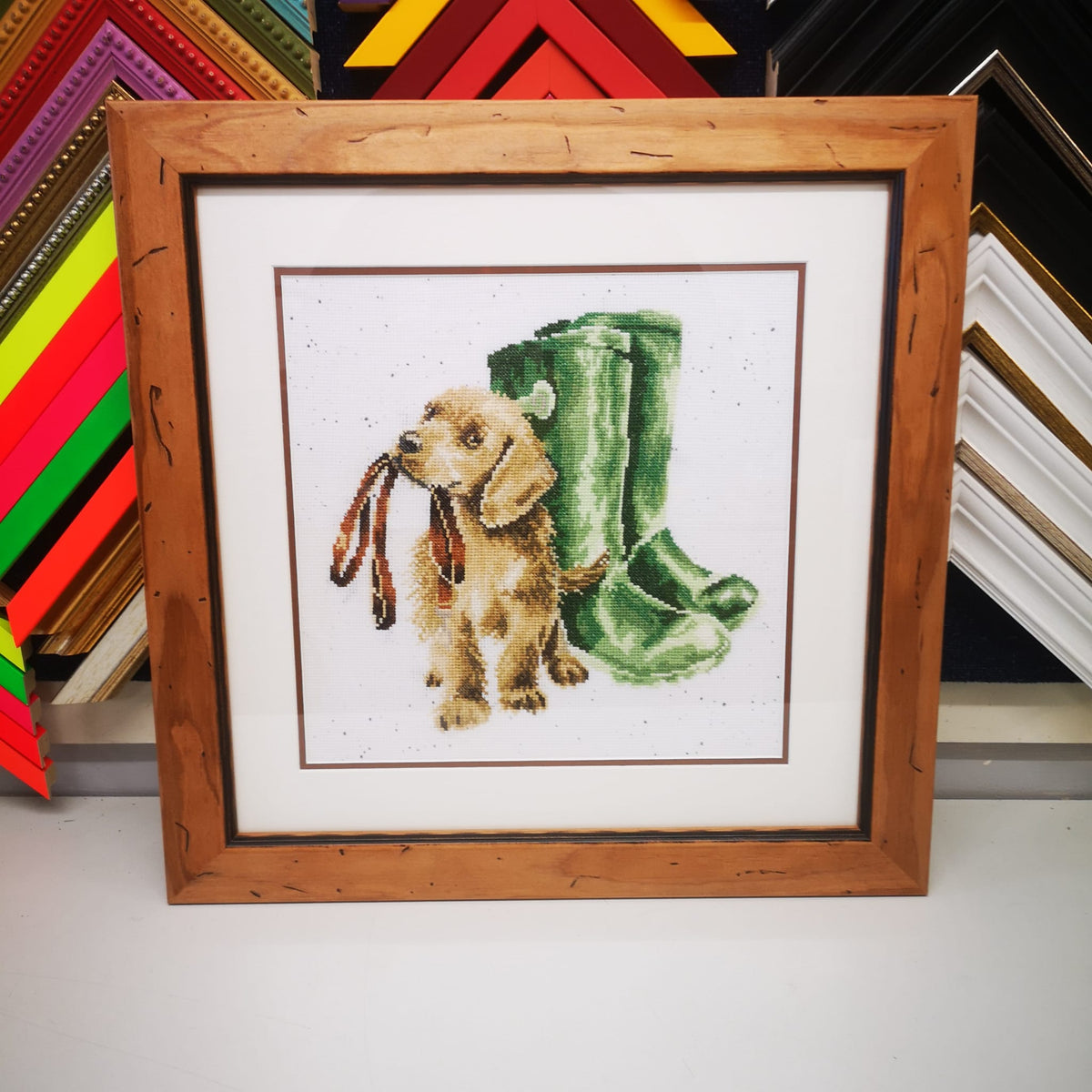 A framed cross stitch